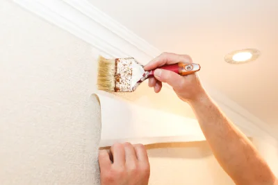 Pose de papier peint à Entrages — revêtements muraux et toiles de verre